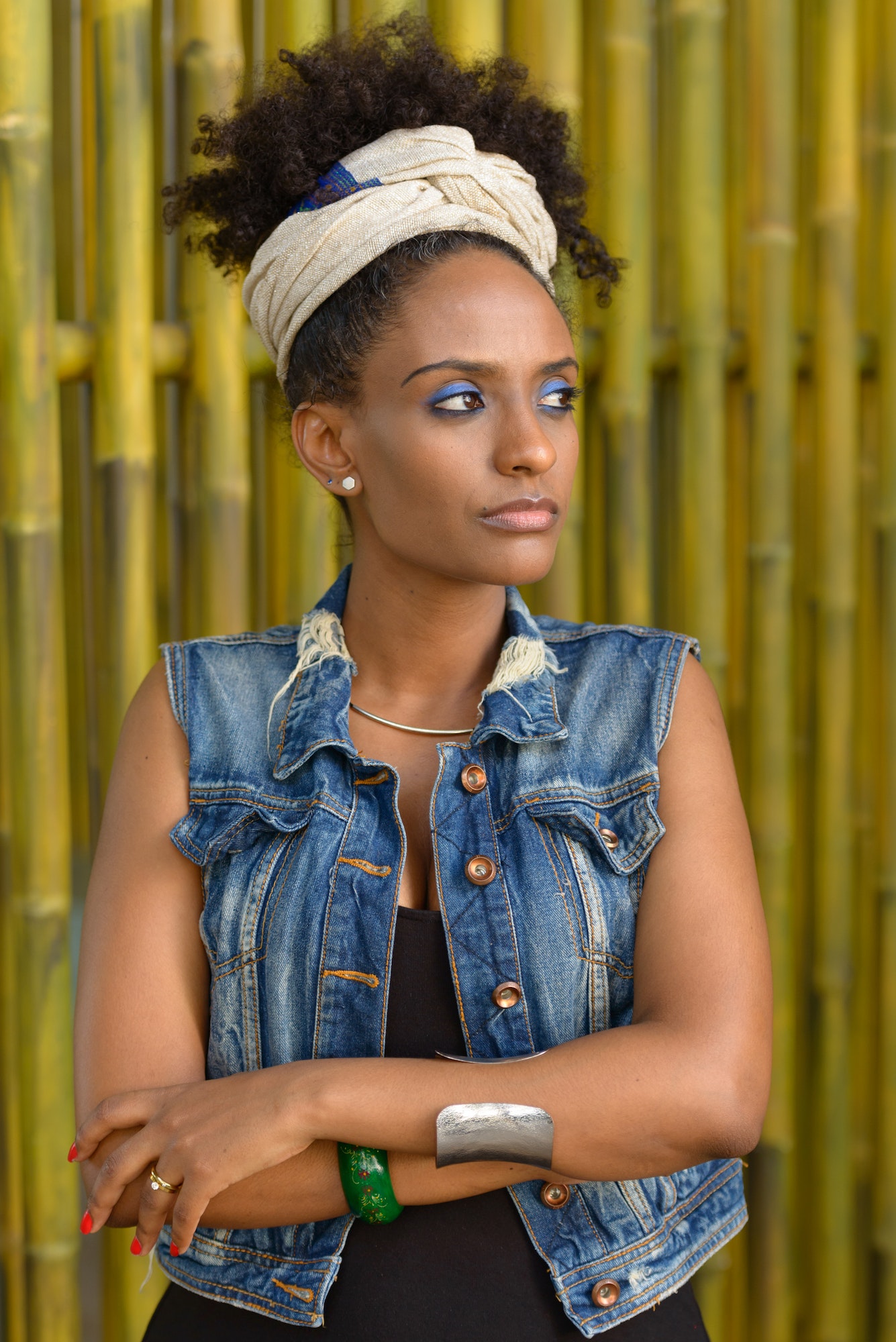 Young beautiful African woman with Afro hair outdoors